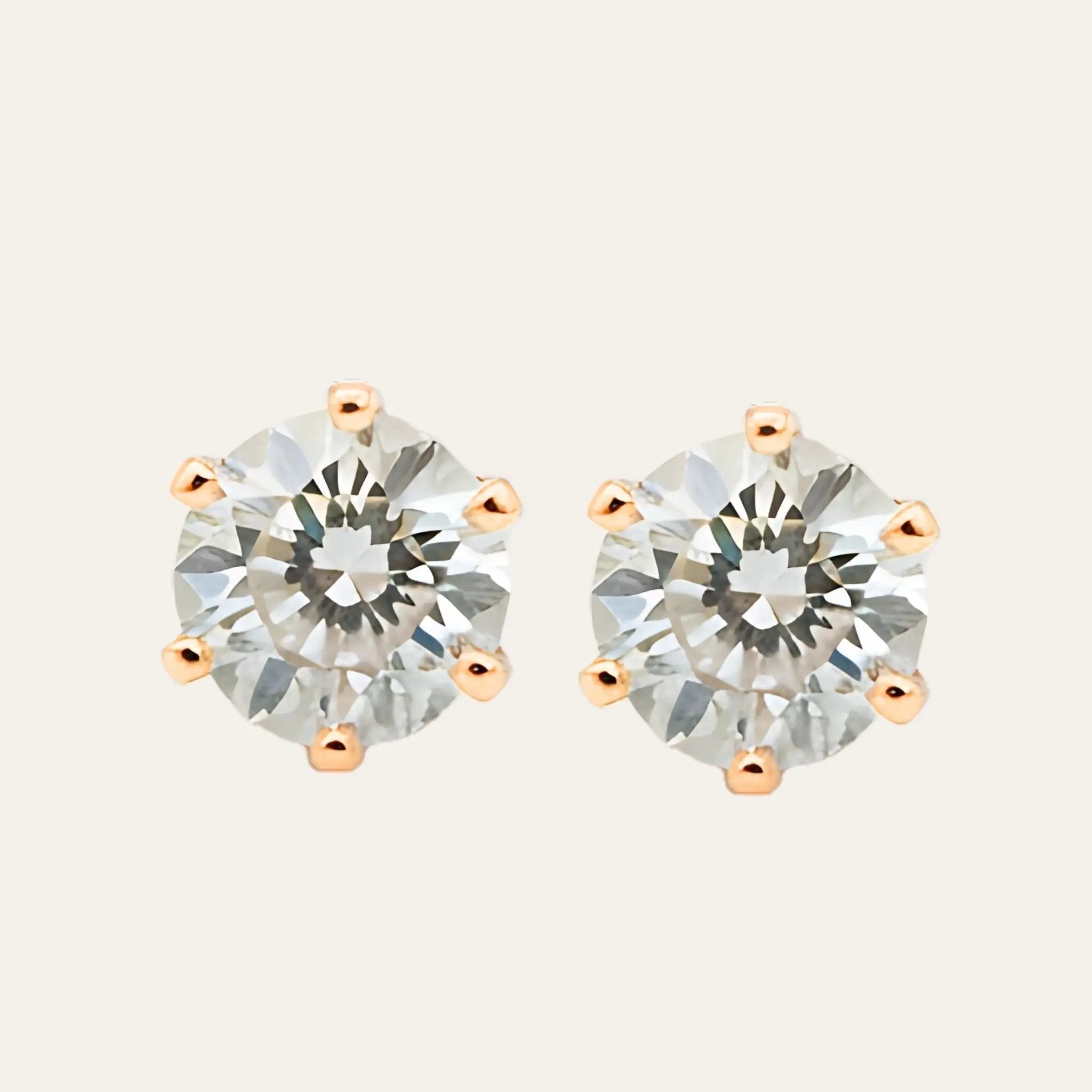 Rosé Solitaire Studs N3VO
